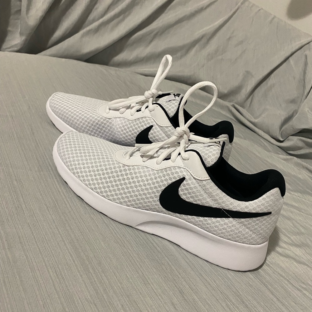 White Nike shoes (size 9 men)